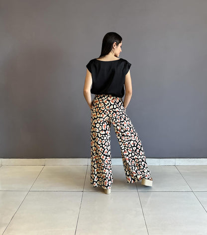 Pantalón palazzo estampado animal print negro amarillo